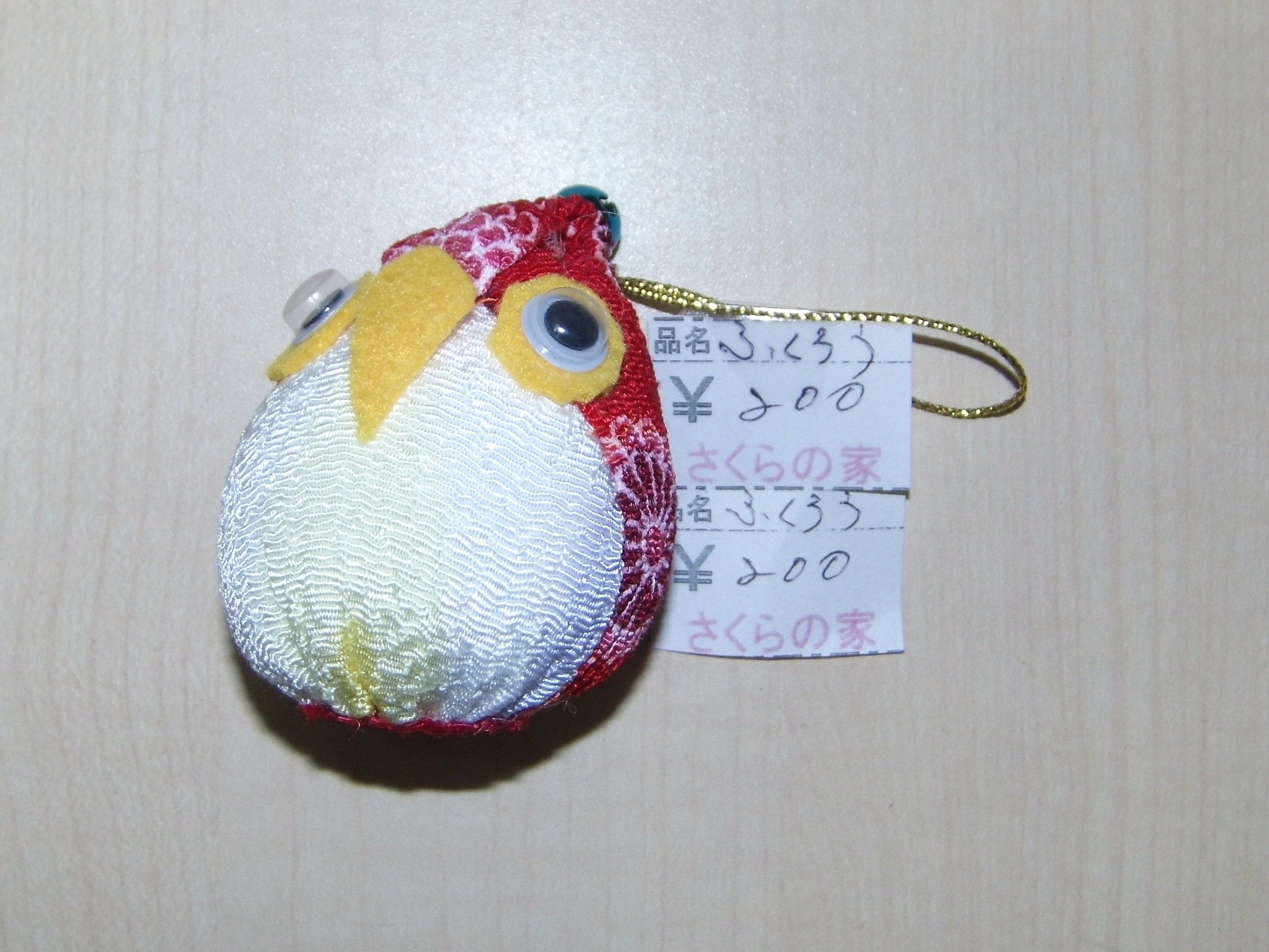 赤と白のフクロウ小物の画像