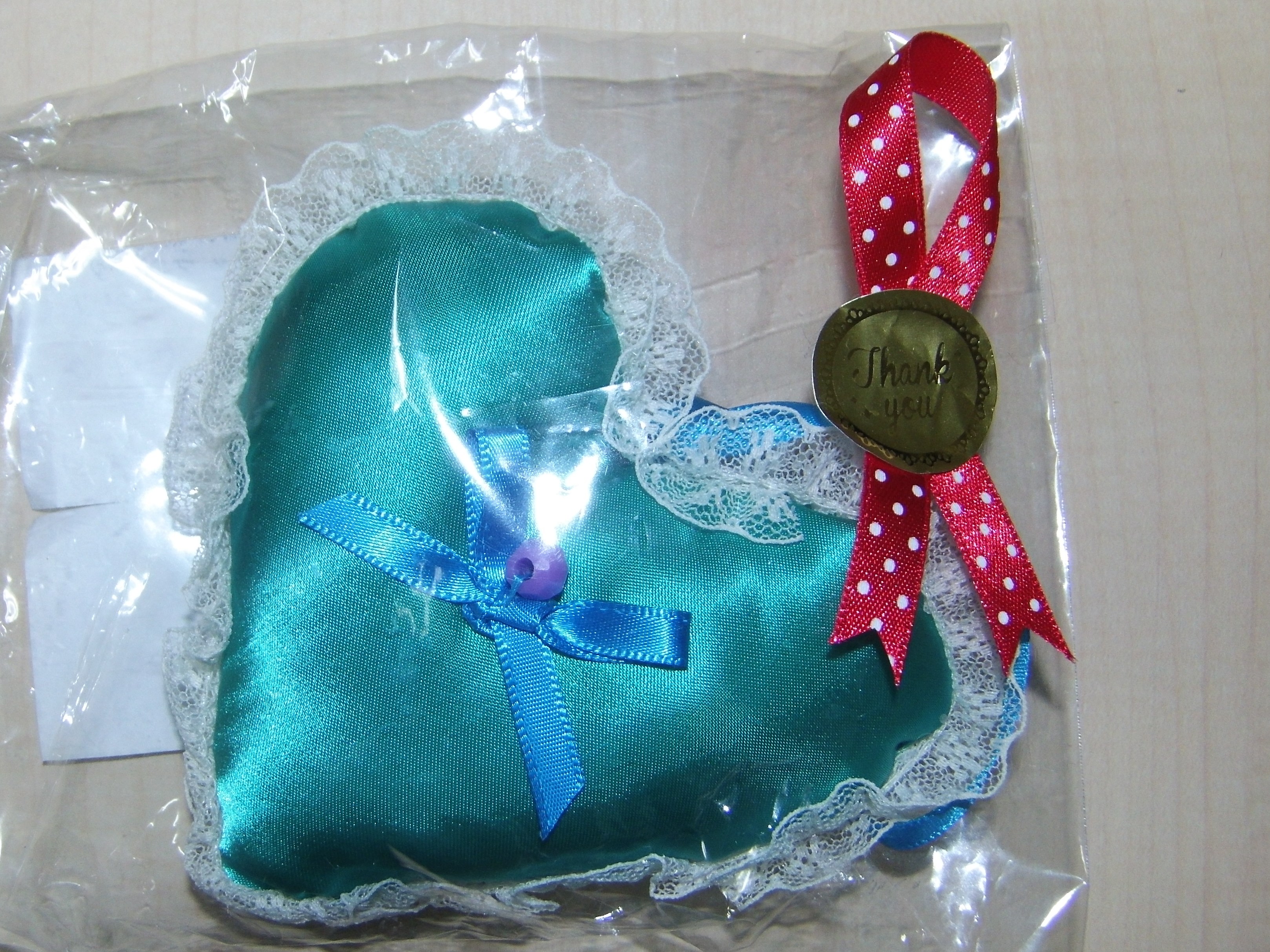 緑の四角い袋の画像